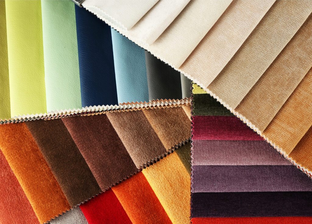 Picture of different swatches of velvet fabric in a variety of colors